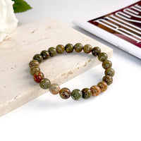 Pulseira de Pedra Natural 6mm Unissex – Elegância, Energia e Proteção